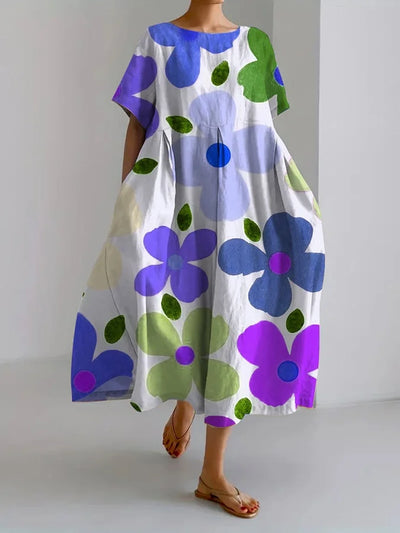 ELIANA | Midi Kjole med Blomsterprint i Afslappet Stil og Sommerkomfort til Farverige Dage