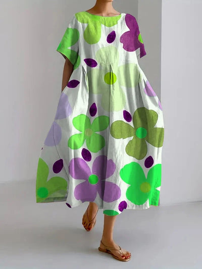 ELIANA | Midi Kjole med Blomsterprint i Afslappet Stil og Sommerkomfort til Farverige Dage